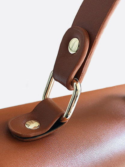 Straw and leather handbag