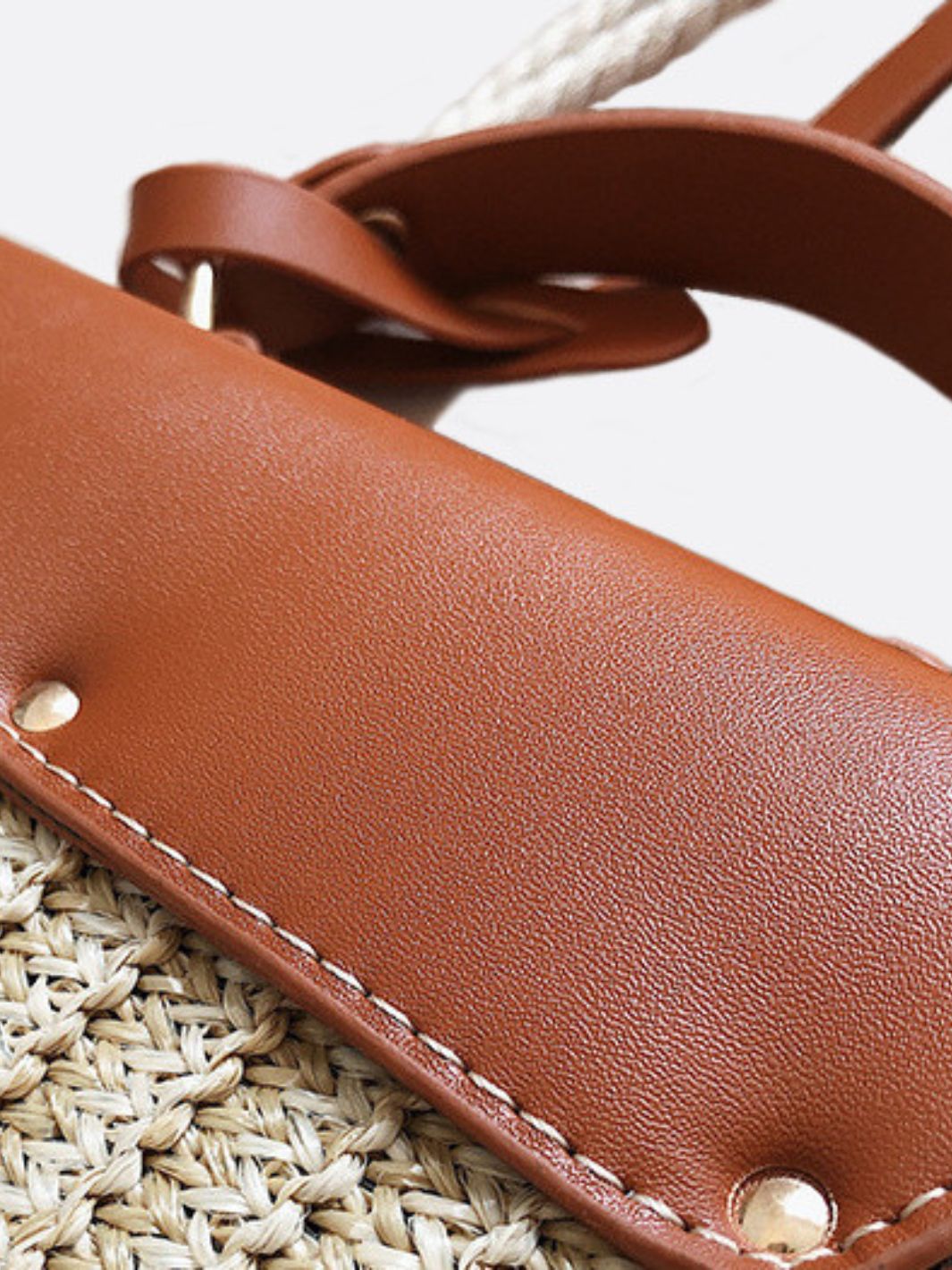 Straw and leather handbag