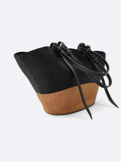 Straw bag with leather handle