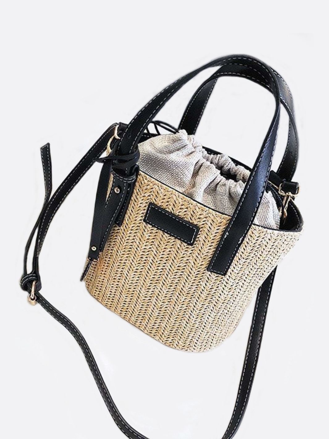Straw and leather bucket bag