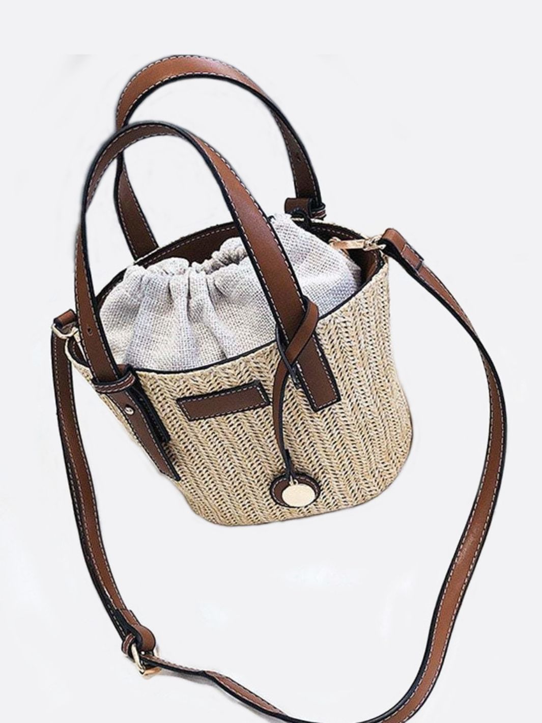 Straw and leather bucket bag