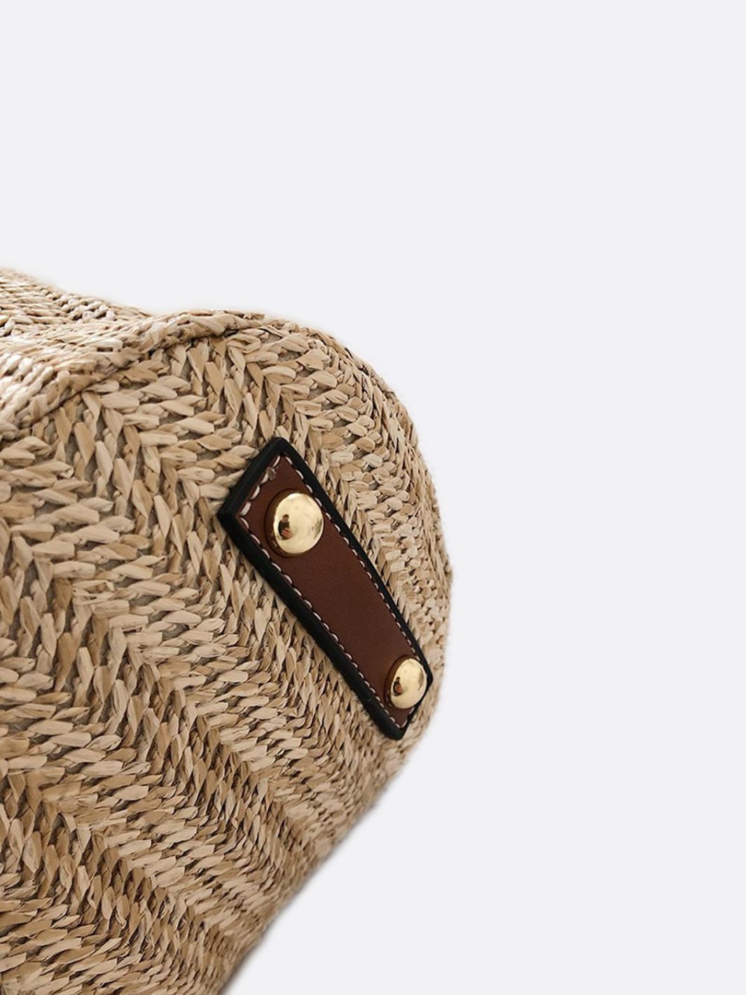 Straw and leather bucket bag